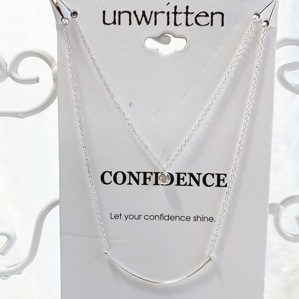 Unwritten cubic zirconia layered silver necklace